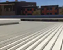 Close up view of metal roofing sheets on commercial premises roof